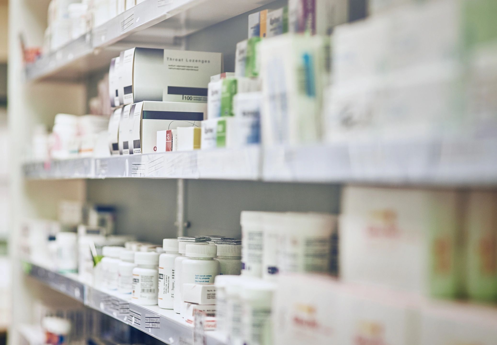 Shelves with packaged pharmacy and medical supply products